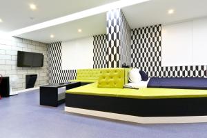 TV a/nebo společenská místnost v ubytování Hotel Home