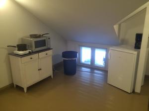 Majoituspaikan Koljonvirran Kartano keittiö tai keittotila