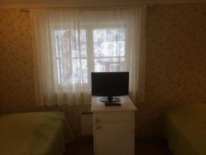 TV tai viihdekeskus majoituspaikassa Koljonvirran Kartano