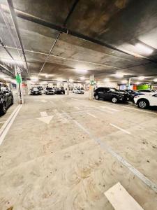 a parking garage with cars parked in it at Mission City Bay in San Francisco