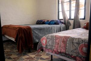 Cama o camas de una habitación en Finca Las Aguas