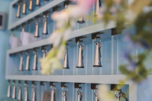 a shelf filled with lots of hanging jewelry at Hotel Continental in Tortoreto Lido