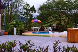 Bazén v ubytování Finca en Guatapé a solo minutos de la piedra, con Jacuzzi & piscina nebo v jeho okolí