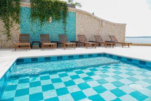 Bazén v ubytování Hotel Caribbean Cartagena nebo v jeho okolí