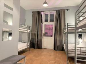 Ένα ή περισσότερα κρεβάτια σε δωμάτιο στο GLOBE Hostel Prague ADULTS ONLY