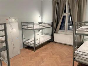 Ένα ή περισσότερα κρεβάτια σε δωμάτιο στο GLOBE Hostel Prague ADULTS ONLY