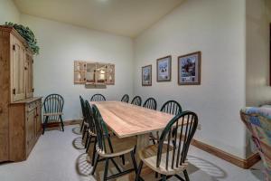 a dining room with a wooden table and chairs at The Perfect Large Family Retreat condo in Beaver Creek