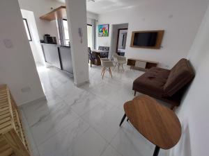 Area tempat duduk di Apartamento Novo - Ubatuba-SP