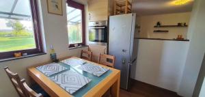 Kuchyňa alebo kuchynka v ubytovaní Holiday home in Balatonkeresztur 43400