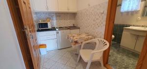 Kuchyň nebo kuchyňský kout v ubytování Apartments in Siofok - Balaton 43407