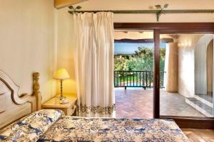 Ένα ή περισσότερα κρεβάτια σε δωμάτιο στο Apartment in Liscia di Vacca - Sardinien 43448