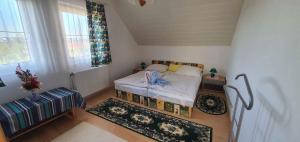 Postel nebo postele na pokoji v ubytování Apartment in Balatonszabadi 43404