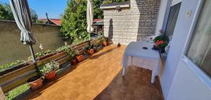 Balkón nebo terasa v ubytování Apartment in Balatonszabadi 43404