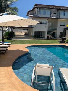 Swimmingpoolen hos eller tæt på Mansão Fragata