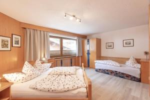 Postel nebo postele na pokoji v ubytování Appartement Rosengarten