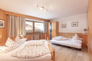 Postel nebo postele na pokoji v ubytování Appartement Rosengarten