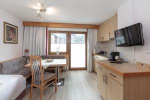Kuchyň nebo kuchyňský kout v ubytování Appartement Rosengarten