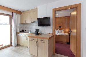 Kuchyň nebo kuchyňský kout v ubytování Appartement Rosengarten