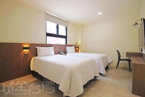 Letto o letti in una camera di Smile Ocean Homestay