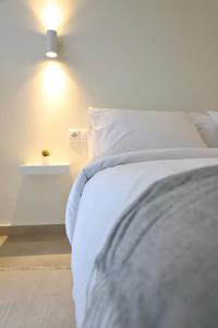 A bed or beds in a room at Aelia Apartment 2 Ioannina