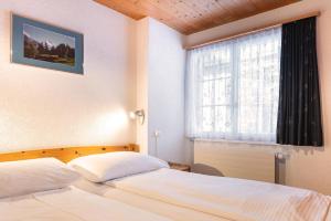 Ένα ή περισσότερα κρεβάτια σε δωμάτιο στο Apartment Arabelle