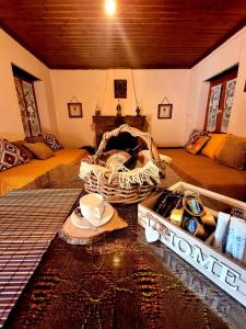 a room with a table with a bowl and a cup at Σπίτι στο βουνό in Tsivlós