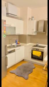 Kuchyň nebo kuchyňský kout v ubytování Lux 1+1 in secured complex