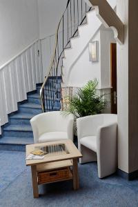 Posezení v ubytování Hotel Hüttl - Garni