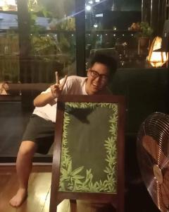 Posezení v ubytování Non House Bangkok บ้านนอนโฮสเทล