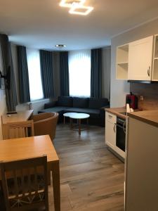 Kuchyň nebo kuchyňský kout v ubytování Apartment Hotel Rüther