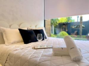מיטה או מיטות בחדר ב-Containers Gramado Homes by Achei Gramado