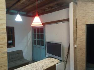 TV a/nebo společenská místnost v ubytování Castelinho
