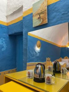 Příslušenství pro přípravu čaje a kávy v ubytování Nubian palace - by kerma hospitality