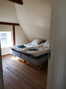 Postel nebo postele na pokoji v ubytování Møllehusets Bed & Breakfast