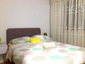 Postel nebo postele na pokoji v ubytování Nar Apartment