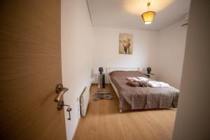 En eller flere senge i et værelse på Trikala center 5