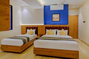 Postel nebo postele na pokoji v ubytování Metropolis Business Hotel