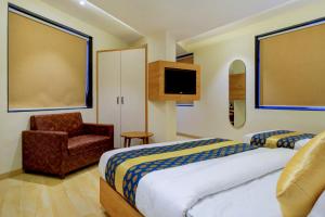 TV a/nebo společenská místnost v ubytování Metropolis Business Hotel