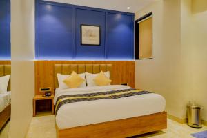 Postel nebo postele na pokoji v ubytování Metropolis Business Hotel