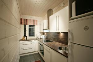 Imagen de la galería de Ounasvaaran Lakituvat Chalets, en Rovaniemi