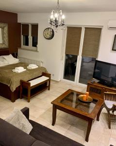 Posteľ alebo postele v izbe v ubytovaní Apartament Kawowy