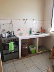Kuchyň nebo kuchyňský kout v ubytování Centrico, cómodos y ecónomicos Departamentos, monoambientes completos y cuartos