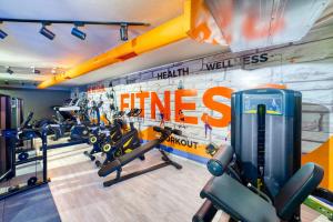 a gym with treadmills and machines in it at Aria Riva Apart Hotel in Alanya
