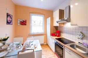 a kitchen with a sink and a counter top at Harztour 1 Ferienwohnung in Quedlinburg