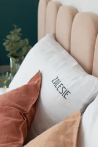 Posteľ alebo postele v izbe v ubytovaní Willa Zalesie