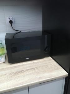 Kuchnia lub aneks kuchenny w obiekcie Apartament Centrum