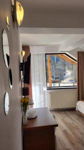 TV a/nebo společenská místnost v ubytování M7 Villa Bed& Bistro