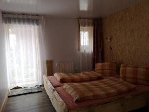 Un pat sau paturi într-o cameră la Chez Martial