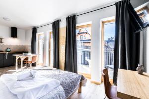 Łóżko lub łóżka w pokoju w obiekcie Apartament Sova