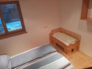 Postel nebo postele na pokoji v ubytování Haus Hotz Apart Talblick